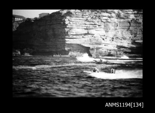 Offshore powerboat racing 1970s, two contestants heading out