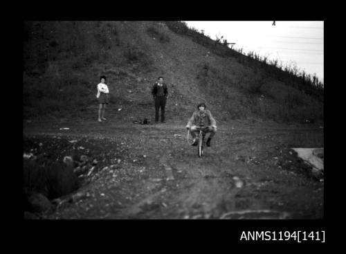 Man on motorized bike