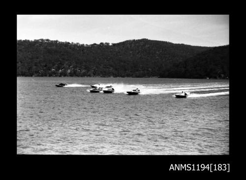 Cowan Creek TV ad filming early 1970s, seven hydroplanes at speed