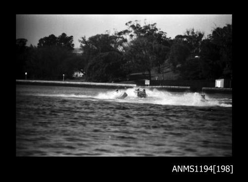 Hen and Chicken Bay 1970s, three unidentified outboard runabouts