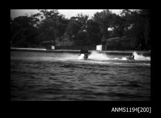 Hen and Chicken Bay 1970s, two unidentified outboard runabouts