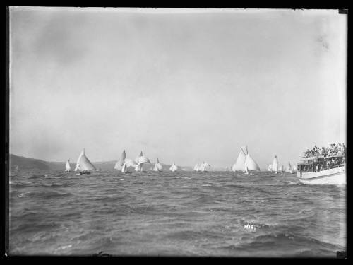 The 18-footer fleet runs downwind on Queen of the Harbour Day January 1931, inscribed 3934