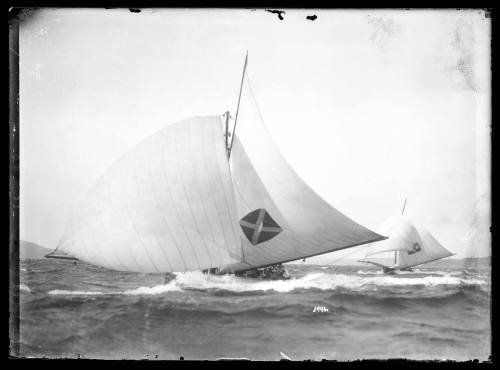 Two 18-foot skiffs on a shy run across the wind on Sydney Harbour