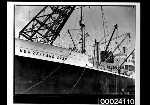 Crane at Cockatoo Island Dockyard unloading a transformer from the hold of the NEW ZEALAND STAR, March 1939.