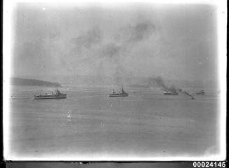 Four naval warships in convoy