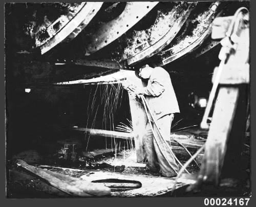 Man repairing SS MONTORO