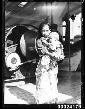 Young Indonesian woman holding a baby on SS VAN REES