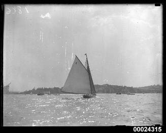 'Anniversary Regatta', single mast sailing vessel underway in Sydney Harbour