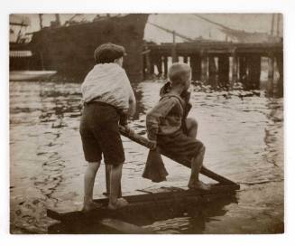 Sydney Harbour scenes : two boys on a raft