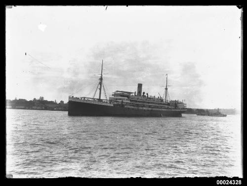 Portside view of a single funnel passenger ship in Sydney Harbour