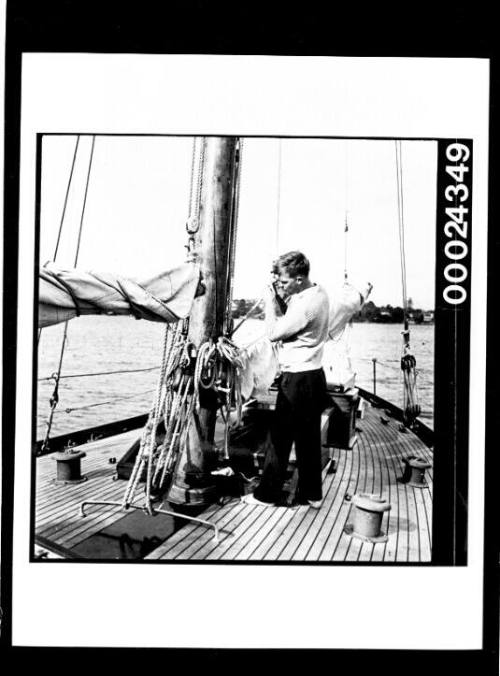 Harold Nossiter Jnr on the deck of yacht SIRIUS