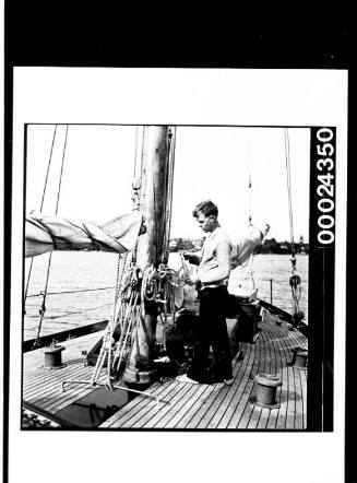 Harold Nossiter Jnr on the deck of yacht SIRIUS