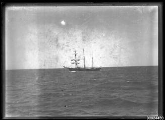 Three-masted barquentine at sea