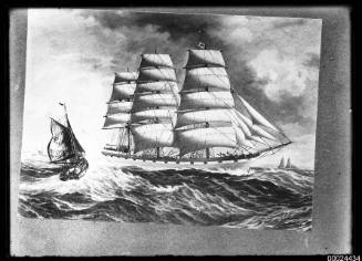 Three-masted ship at sail in rough seas