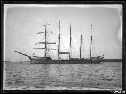 Five-masted barquentine anchored in a harbour