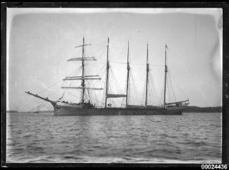 Five-masted barquentine anchored in a harbour