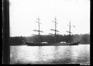 Portside view of the three-masted barque FLOTTBEK anchored in a harbour