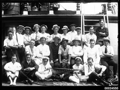 Group portrait of men and boys on the deck of ELGINSHIRE