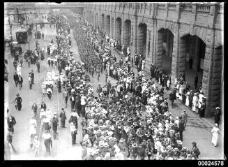Australian Army soldiers marching along Eddy Avenue next to Central Railway Station, Sydney