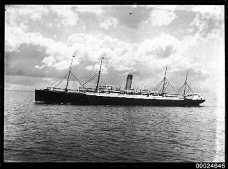 Starboard view of a White Star Line passenger steamship, possibly SS CERAMIC, at sea