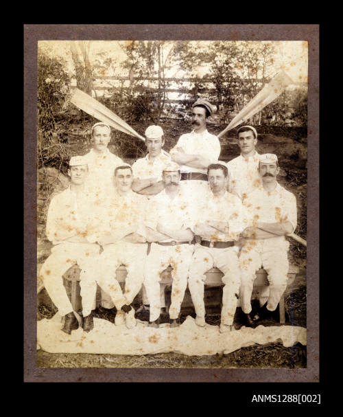 Photograph of a Sydney Rowing Club Eights crew in a bush setting