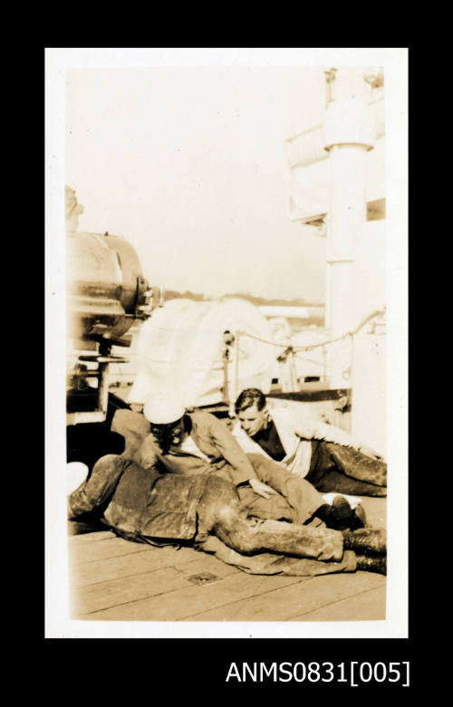 Sailors sleeping on deck