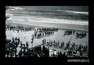 Surf lifesaving clubs assembling after march past on Newcastle beach