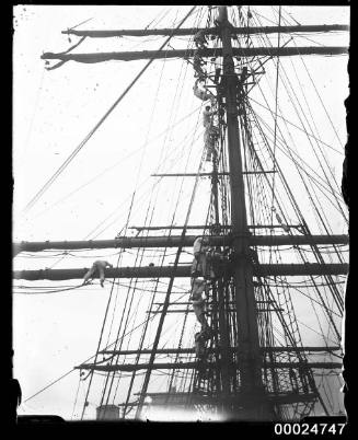 Sailors climbing the masts possibly of MAGDALENE VINNEN
