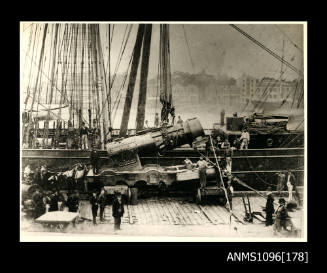 Engine? being lifted on or off sail ship