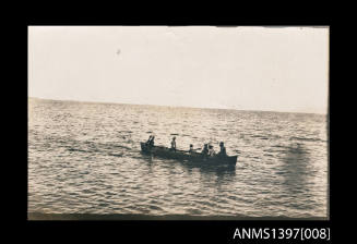 Photograph from Captain William Fowler' photo album depicting a small vessel at sea