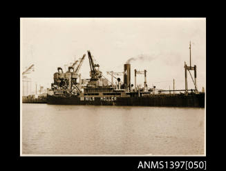 NILS MOLLER docked at a wharf, marked as a neutral ship