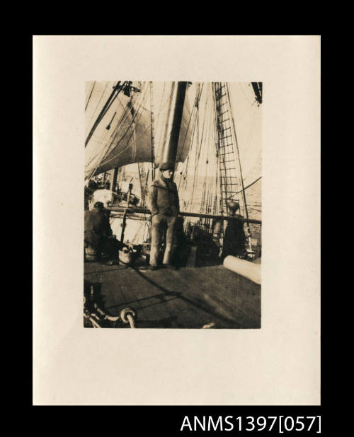 Photograph depicting a man on a ship's deck