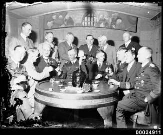 German naval officers and officials at 'Ye Olde Crusty Cellars' in George Street, Sydney