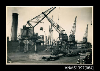 Photograph depicting cars being loaded into the MARION MOLLER