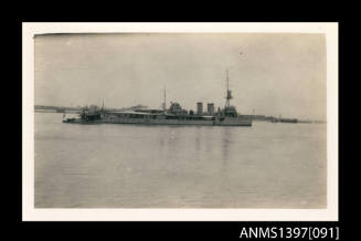 Photograph depicting a view of a ship at sea