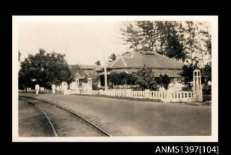 Photograph depicting a view of a house