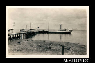 Photograph depicting a shipe moored at a port