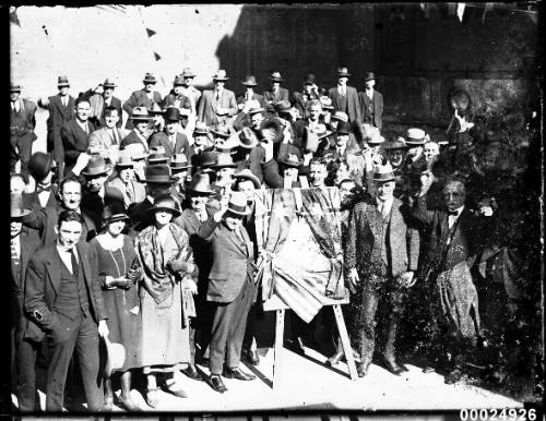 Dignitaries at a plaque unveiling during the United States Navy fleet visit