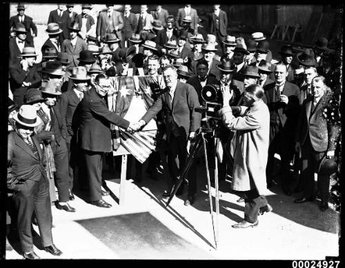 Dignitaries at a plaque unveiling during the United States Navy fleet visit