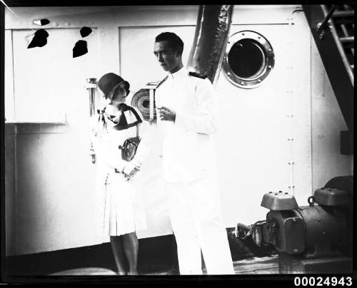 Officer and young woman on board Spanish Navy training ship JUAN SEBASTIAN DE ELCANO