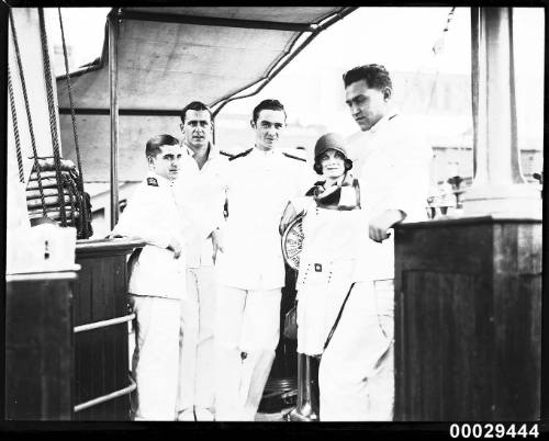 Officers and a young woman on board Spanish Navy training ship JUAN SEBASTIAN DE ELCANO