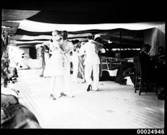 Officers and guests dancing on board Spanish Navy training ship JUAN SEBASTIAN DE ELCANO