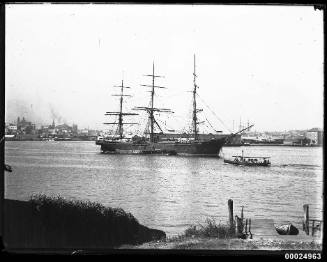 Three masted fully rigged ship dischargin timber at Darling Harbour, Sydney