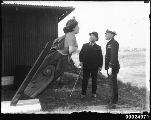 Sir Robert Archdale Parkhill inspects a ship's figurehead at Snapper Island, Sydney