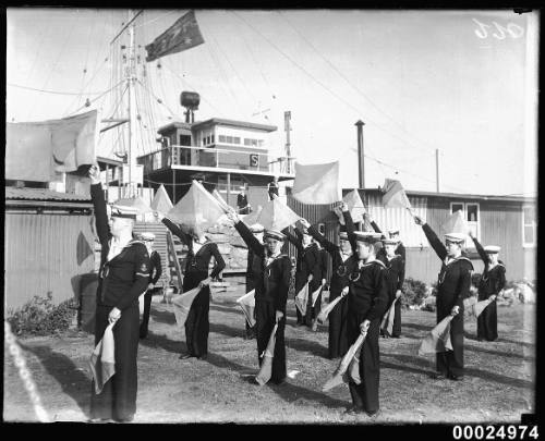 Navy Sea League Cadets with signal flags at Snapper Island in Sydney