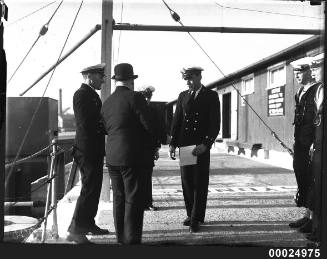 Sir Robert Archdale Parkhill with senior officers of the Royal Australian Navy