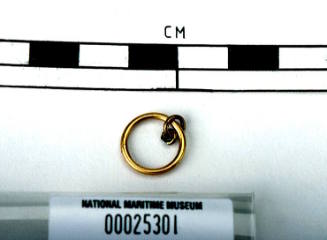 Gold link recovered from the wreck of the DUNBAR