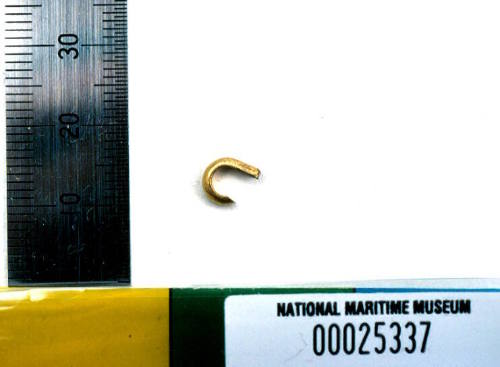 Gold latch hook for pendant recovered from the wreck of the DUNBAR