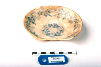 Small bowl with blue grapevine transfer pattern recovered from the wreck of the DUNBAR