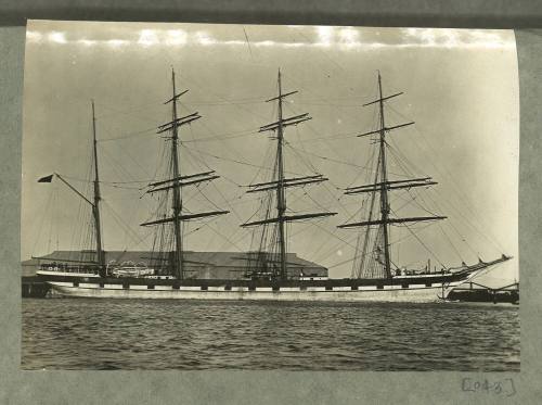 Barque berthed at a wharf